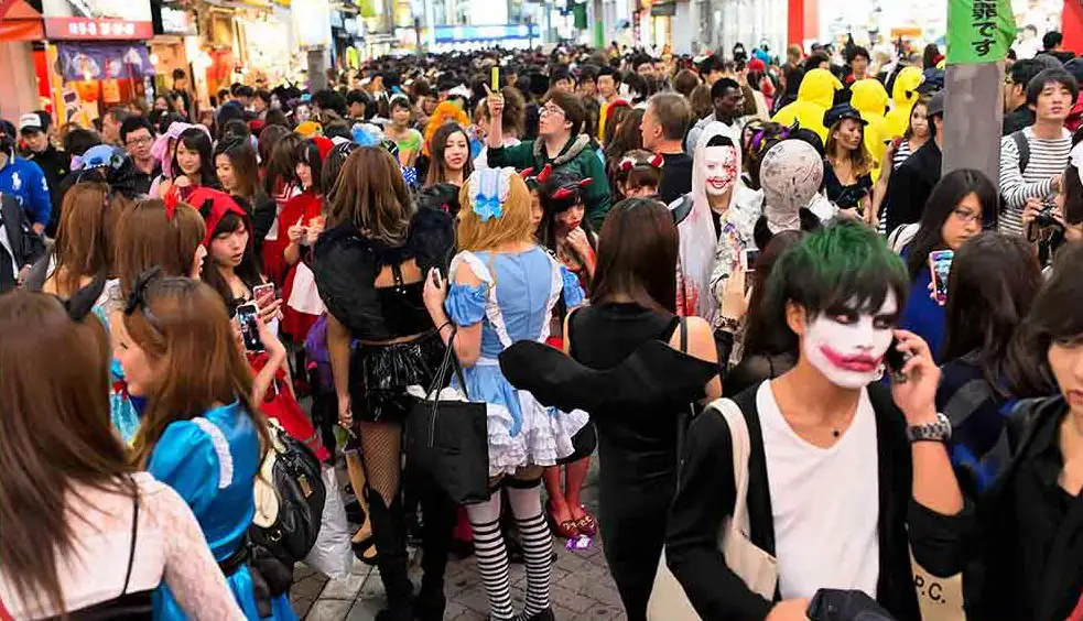 A crowd of Japanese people with a Halloween costume in Tokyo