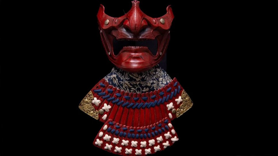 half mempo samurai mask of Japanese warrior representing a Oni demon